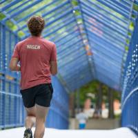 Participant running through little mac bridge